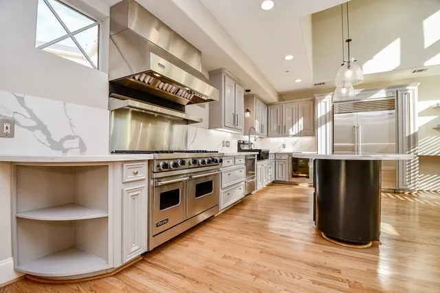 a view of kitchen with microwave and stove
