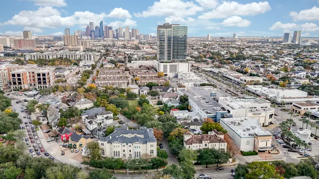 a view of a city with tall buildings