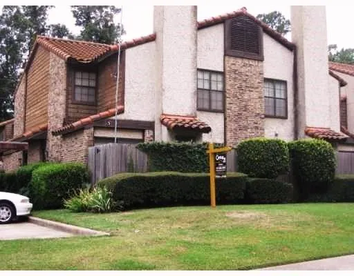 a view of a house with a garden