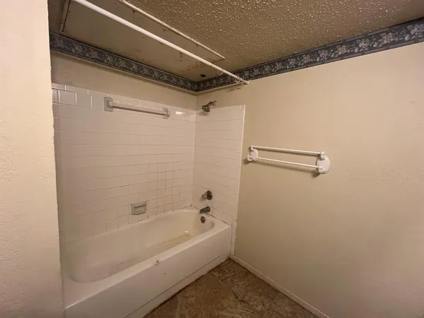 a bathroom with a sink and mirror view