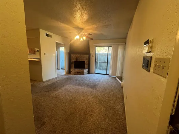 a view of a livingroom with a fireplace