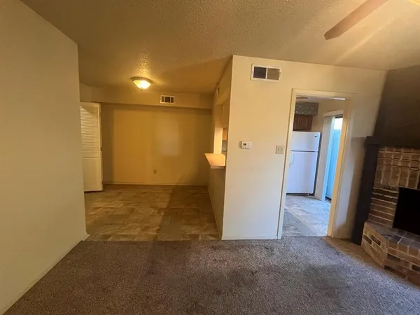 a view of a livingroom with a fireplace