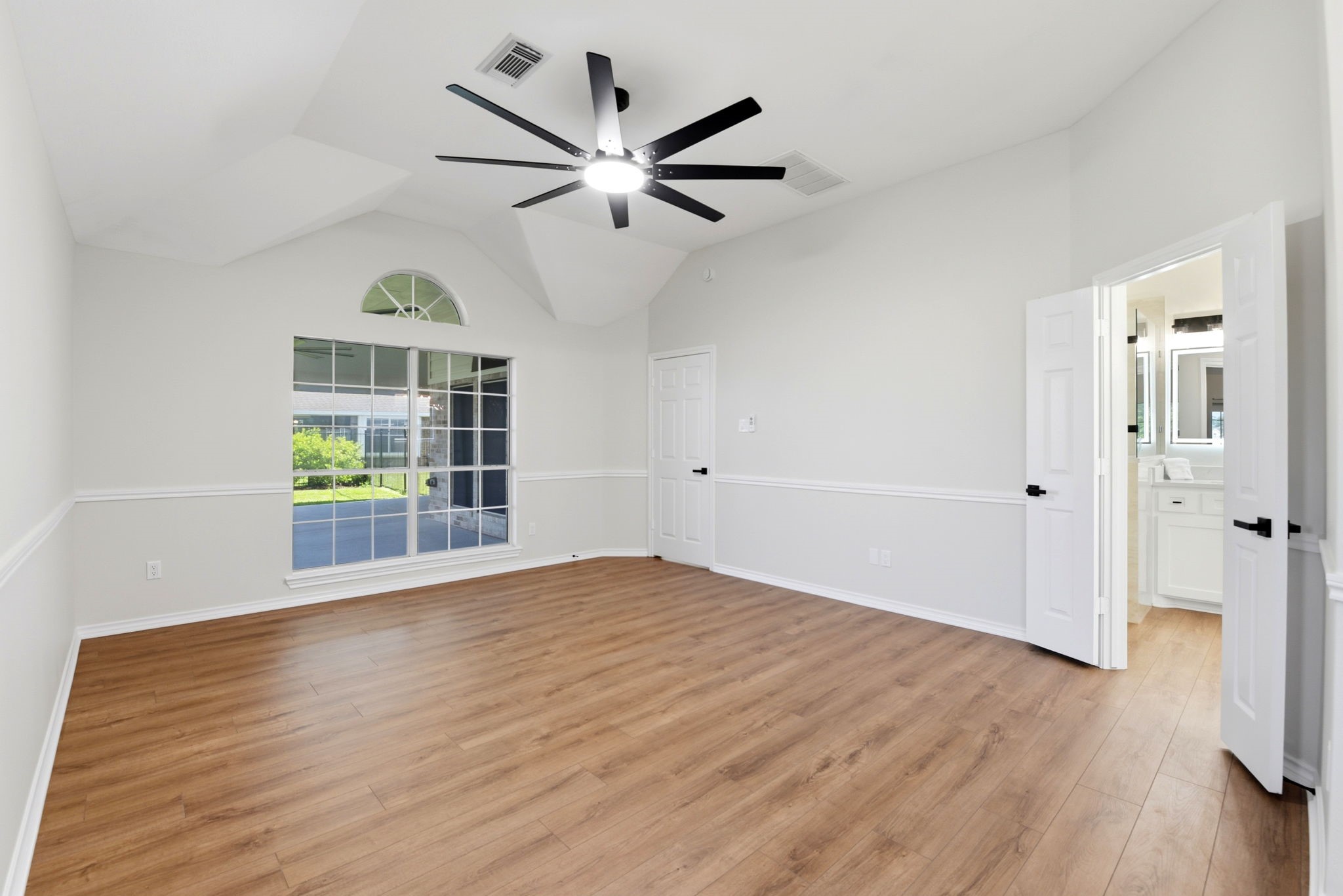 29819 South Legends Village Circle Spring, TX 77386 - Photo 26 of 48 wooden floor in an empty room with a window