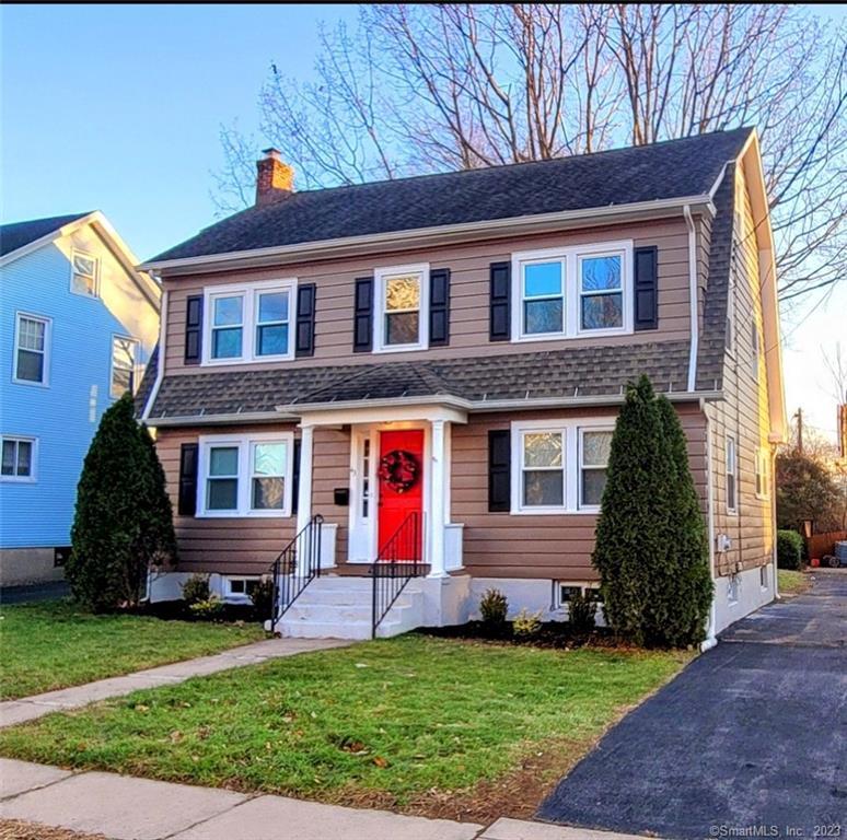 43 Carroll Road East Hartford, CT 06108 - Photo 1 of 1 a front view of a house with a yard