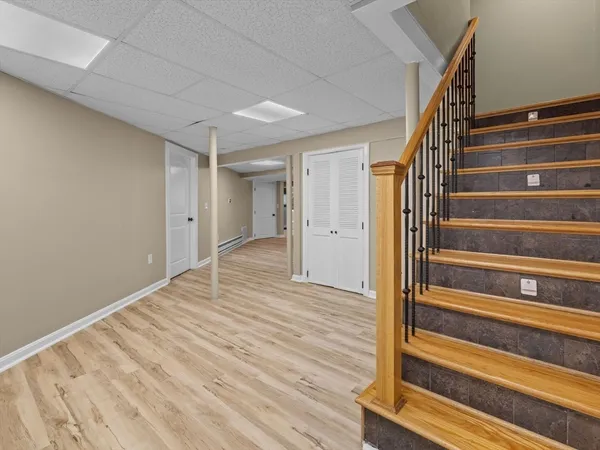 a view of wooden floor in an empty room