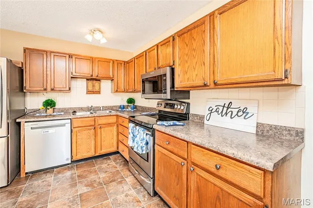 $325,000 | 1044 Holly River Drive, Florissant, MO 63031