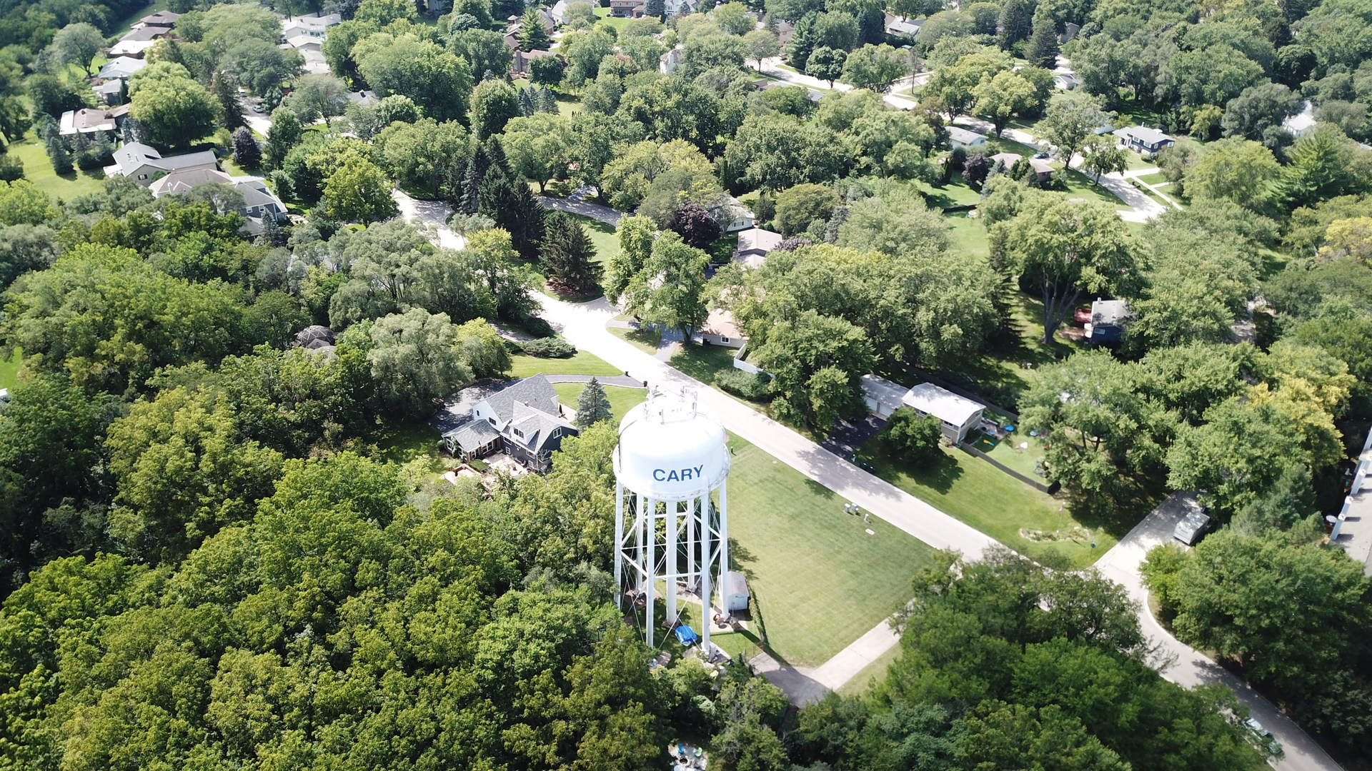 279 Spring Street Cary, IL 60013 - Photo 5 of 8 view of a lake with a tree