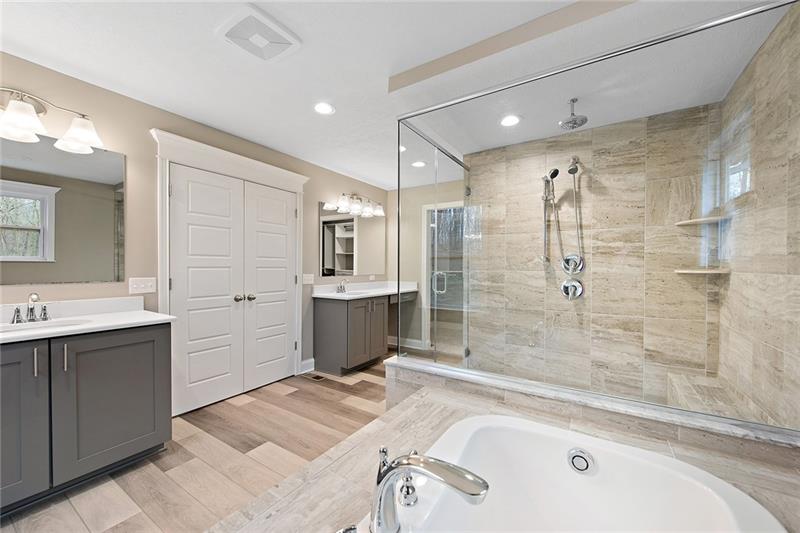 193 Witherow Road Sewickley, PA 15143 - Photo 15 of 25 The master on-suite has a jetted tub and tile shower with 3 shower heads.