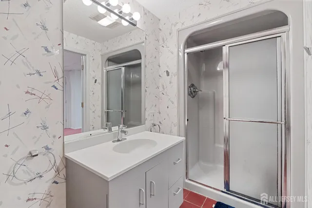 a view of house with a yard