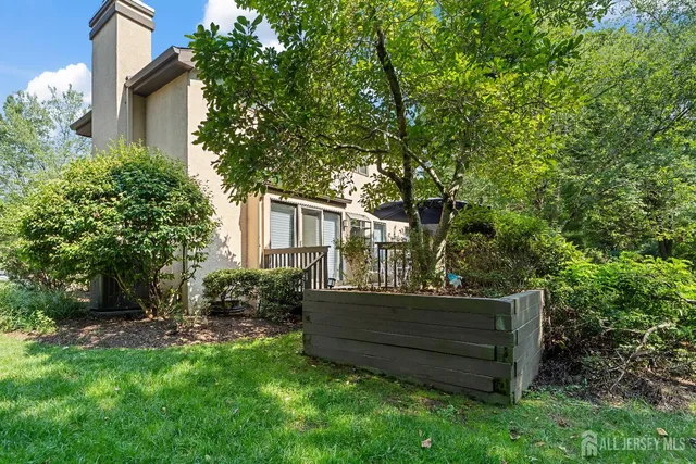 a patio with table and chairs