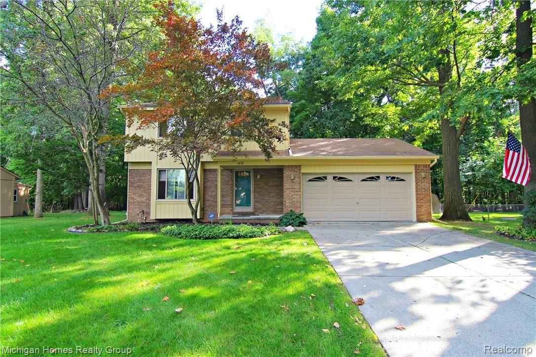 1410 Omega Road Walled Lake, MI 48390 - Photo 1 of 23 Omega Rd Front.jpg