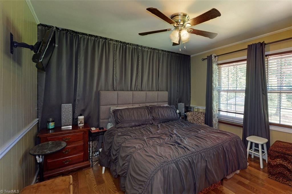 6028 Brantley Gordon Road Denton, NC 27239 - Photo 24 of 34 Master bedroom with large windows to look out over the backyard.