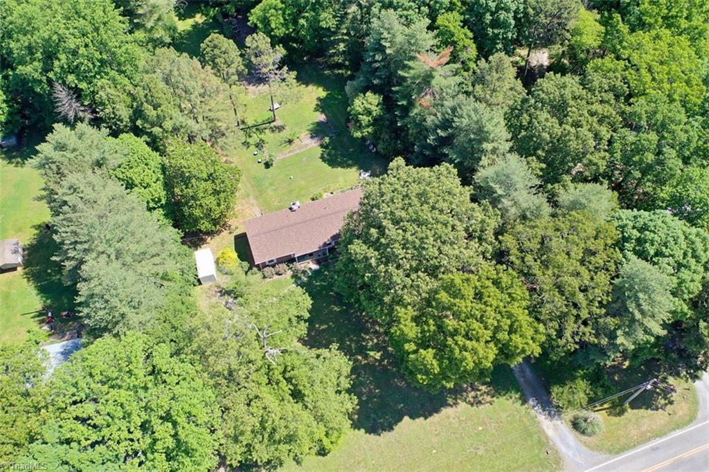 6028 Brantley Gordon Road Denton, NC 27239 - Photo 31 of 34 Drone view of the home in the center. Look at that BIG flat front yard!