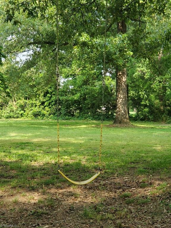 6028 Brantley Gordon Road Denton, NC 27239 - Photo 8 of 34 Here is a lonely swing waiting for you in the front yard.