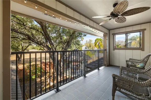 a view of a porch with furniture