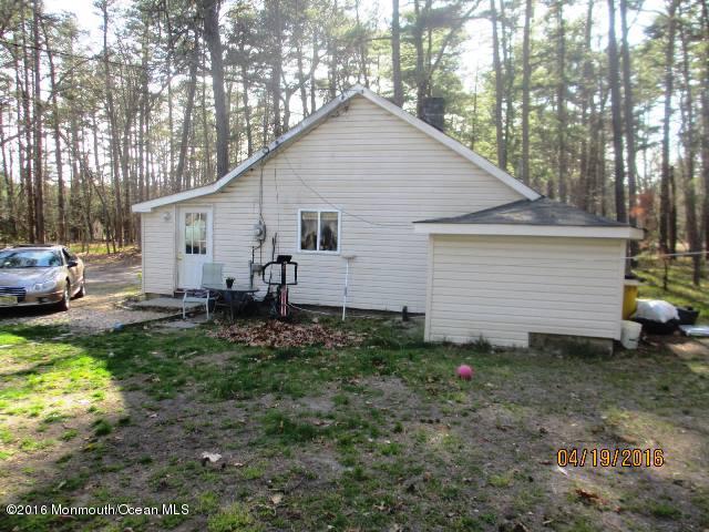 110 Thompson Bridge Road Jackson, NJ 08527 - Photo 3 of 5 a view of backyard of house with outdoor seating
