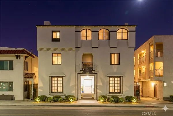 a front view of a multi story residential apartment building