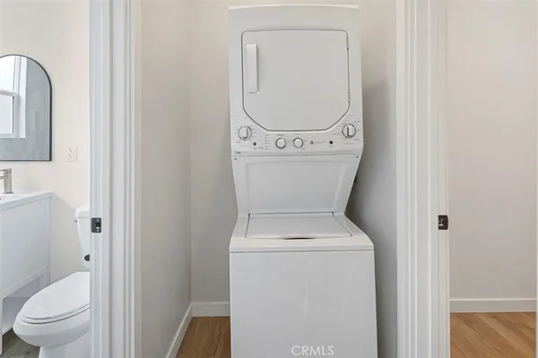 a view of bathroom with a toilet and a sink