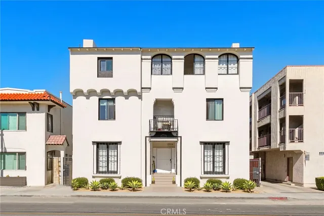 an aerial view of a city with lots of residential buildings