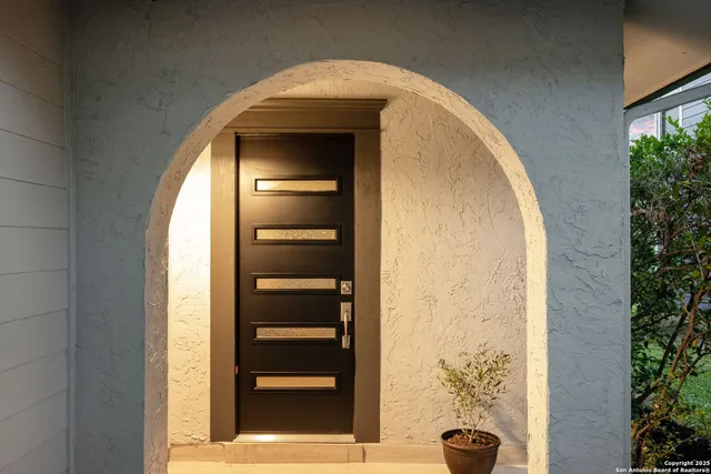 a view of front door with stairs