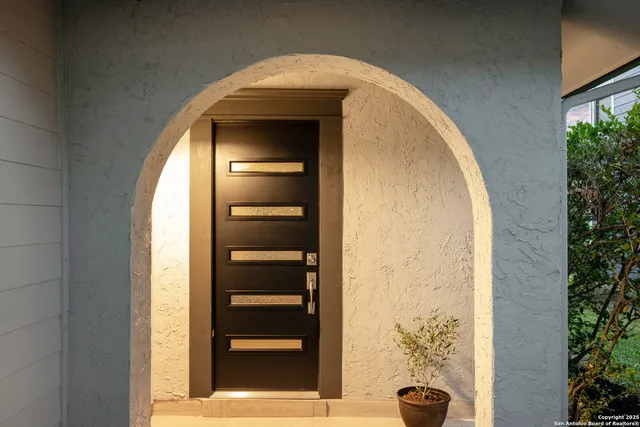 a view of front door with stairs