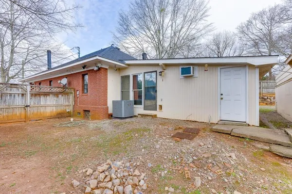 a view of a house with a yard and garage
