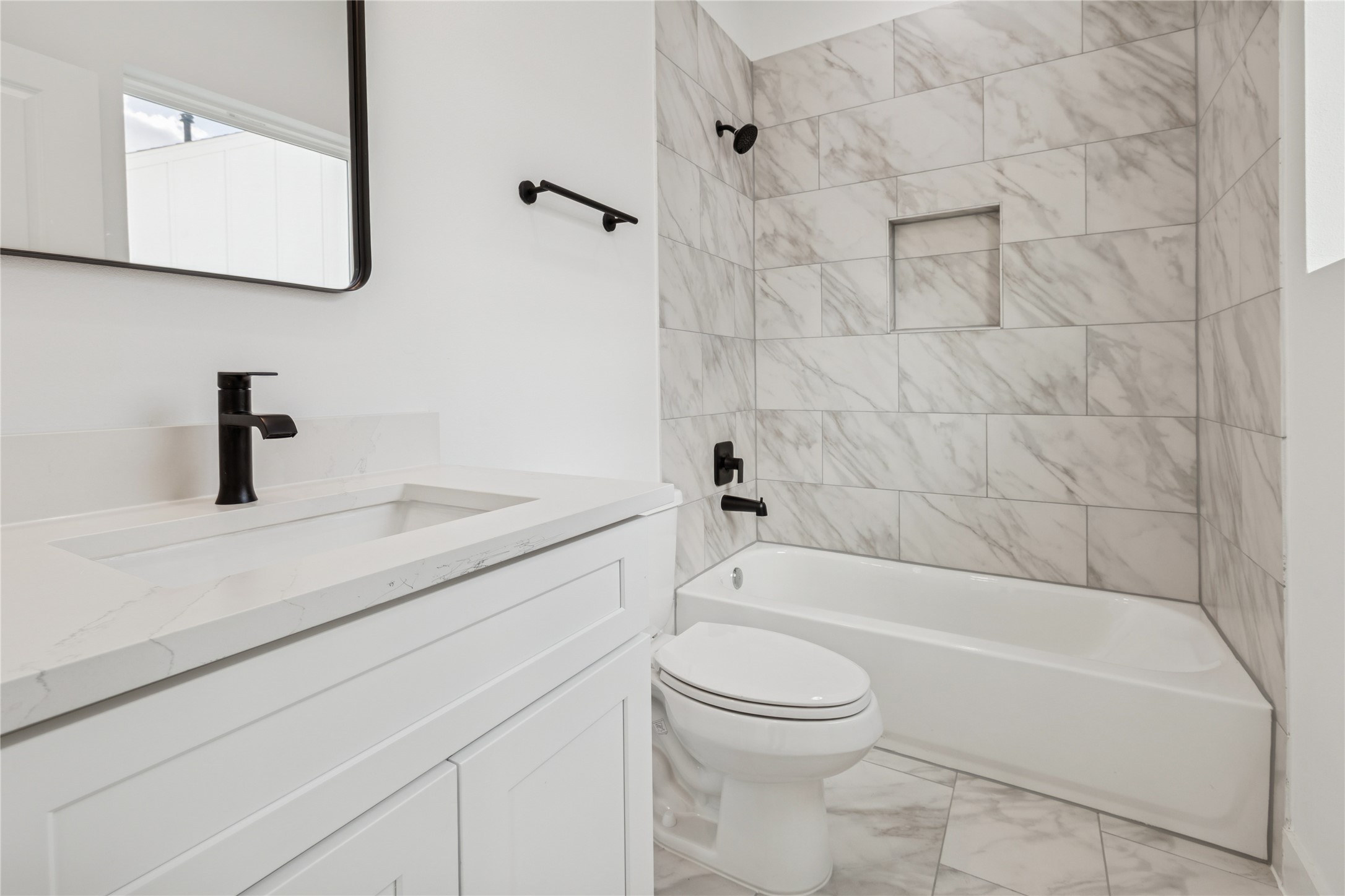111 Milby Street Houston, TX 77003 - Photo 27 of 34 a bathroom with a sink a toilet and a bathtub
