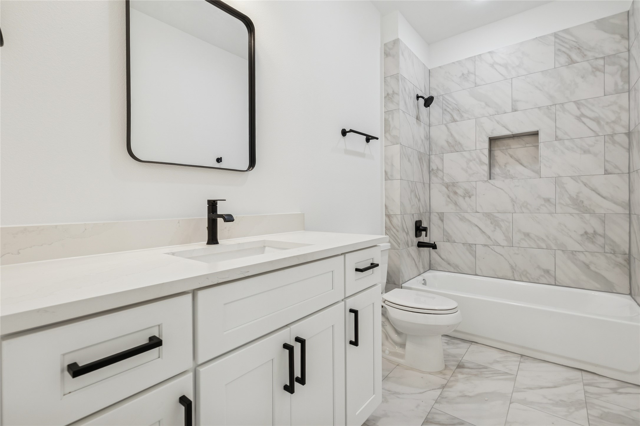 111 Milby Street Houston, TX 77003 - Photo 7 of 34 a bathroom with a sink a toilet and shower