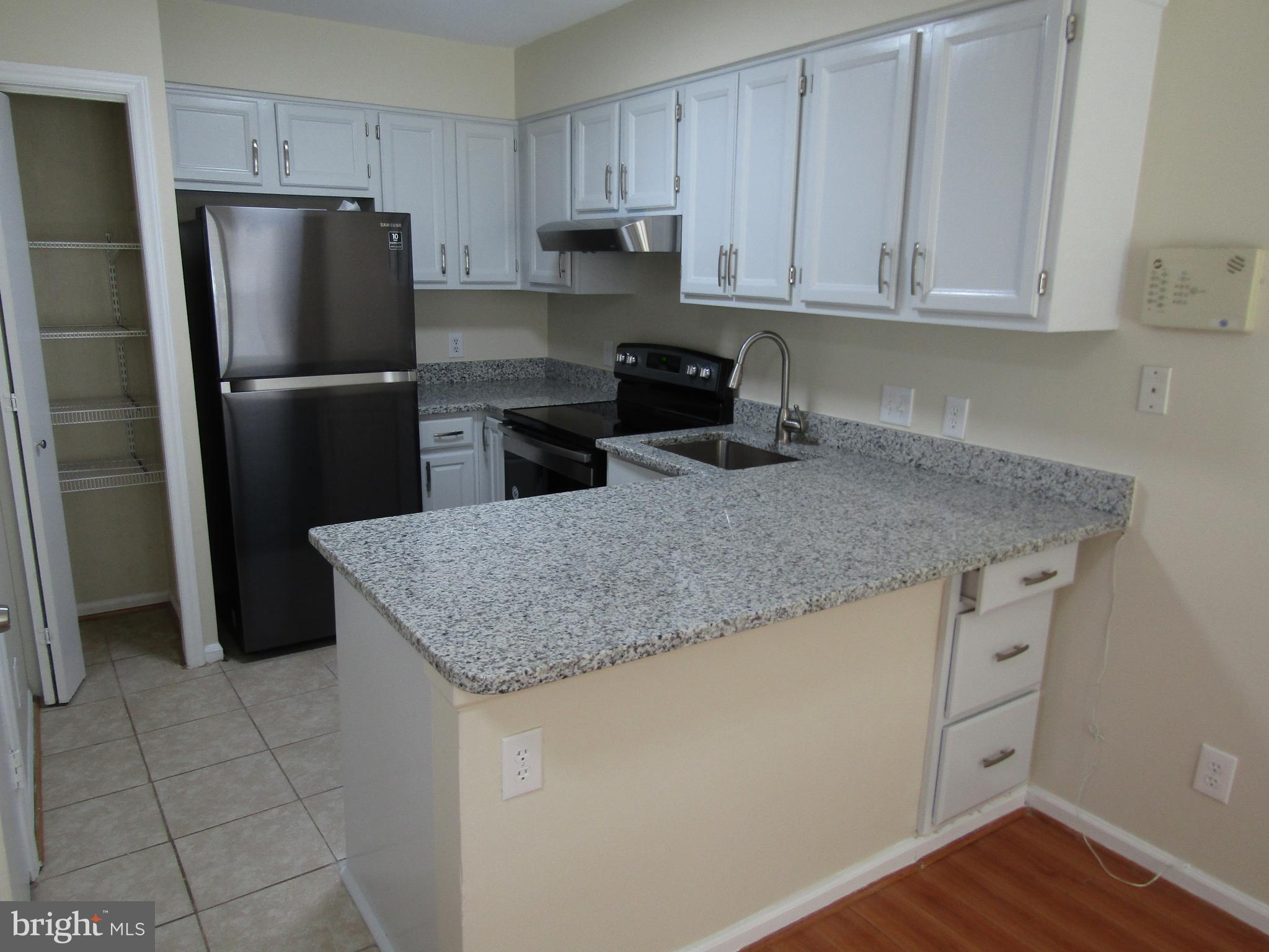6013 Rabbit Hill Court Centreville, VA 20121 - Photo 21 of 54 Kitchen with newly painted cabinets.
