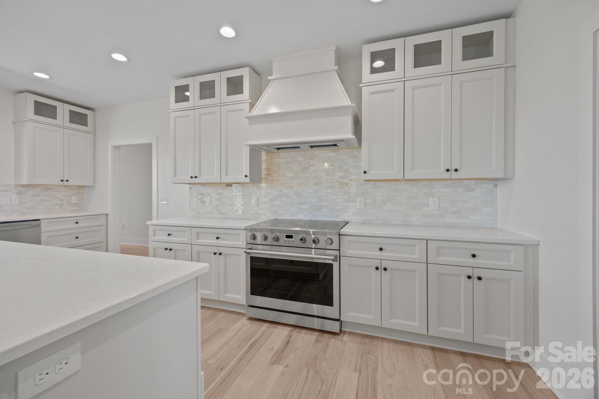 4805 Patterson Road China Grove, NC 28023 - Photo 15 of 42 a kitchen with cabinets stainless steel appliances and a counter space