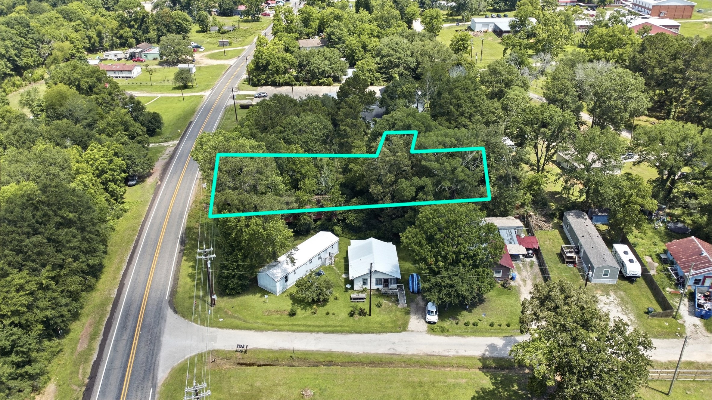 0 State Highway Loop Goodrich, TX 77335 - Photo 5 of 22 an aerial view of a house with a garden view