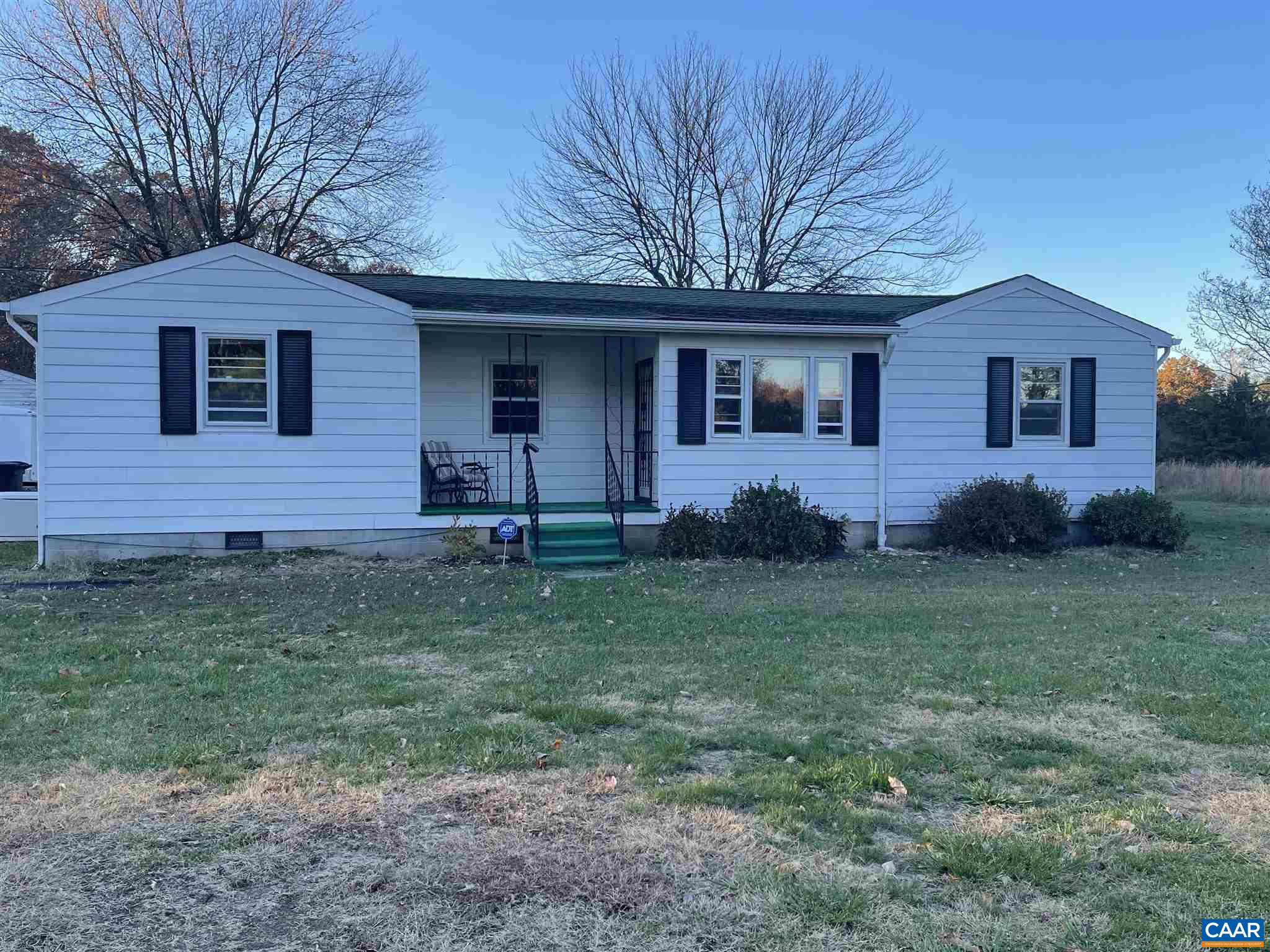 1997 Troy Road Troy, VA 22974 - Photo 2 of 19 a front view of a house with a yard