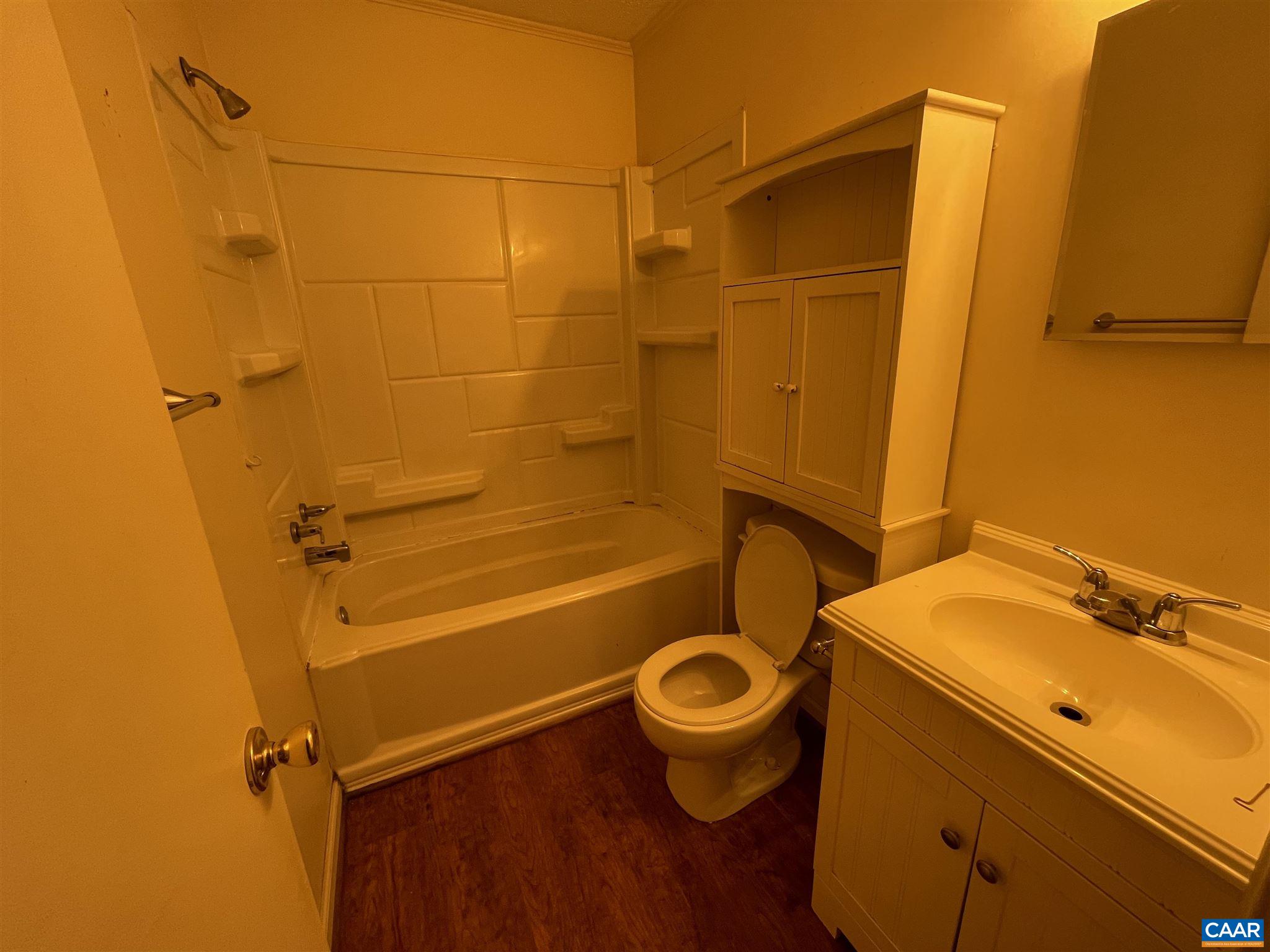 1997 Troy Road Troy, VA 22974 - Photo 10 of 19 a bathroom with a sink and a toilet