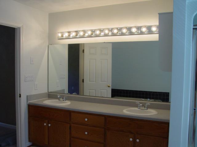4661 Nemmo Road Vinton, VA 24179 - Photo 16 of 34 a bathroom with a sink and a mirror