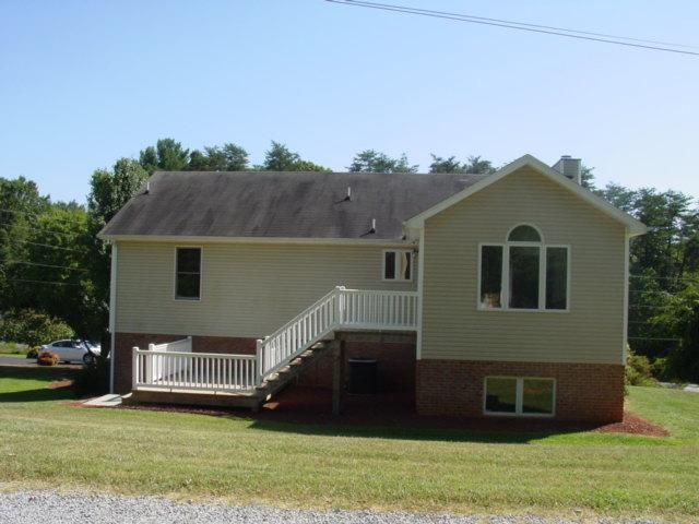 4661 Nemmo Road Vinton, VA 24179 - Photo 5 of 34 a front view of a house with a yard