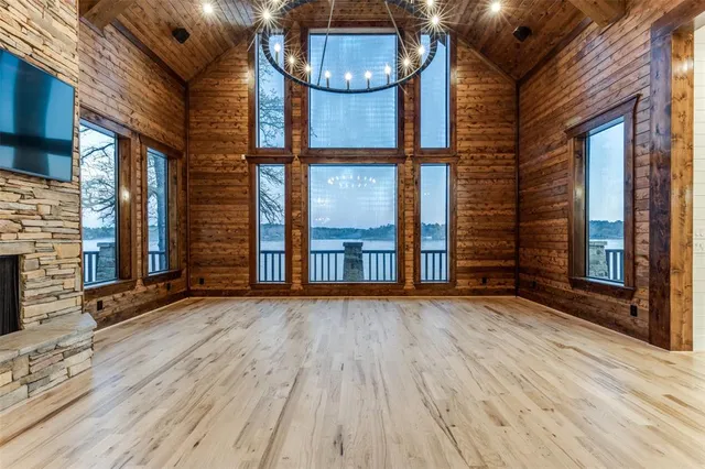 a view of gallery with wooden floor