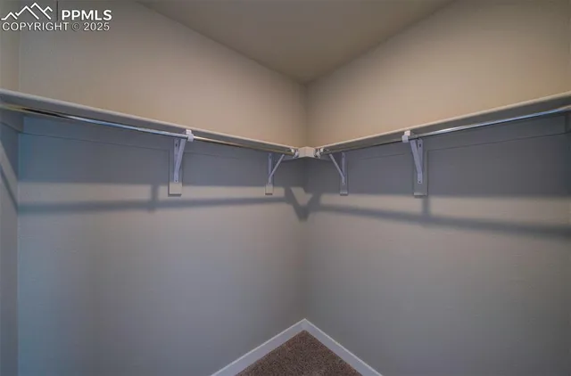 a view of a room with racks on the wall