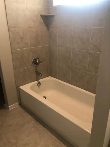 a bathroom with a bathtub