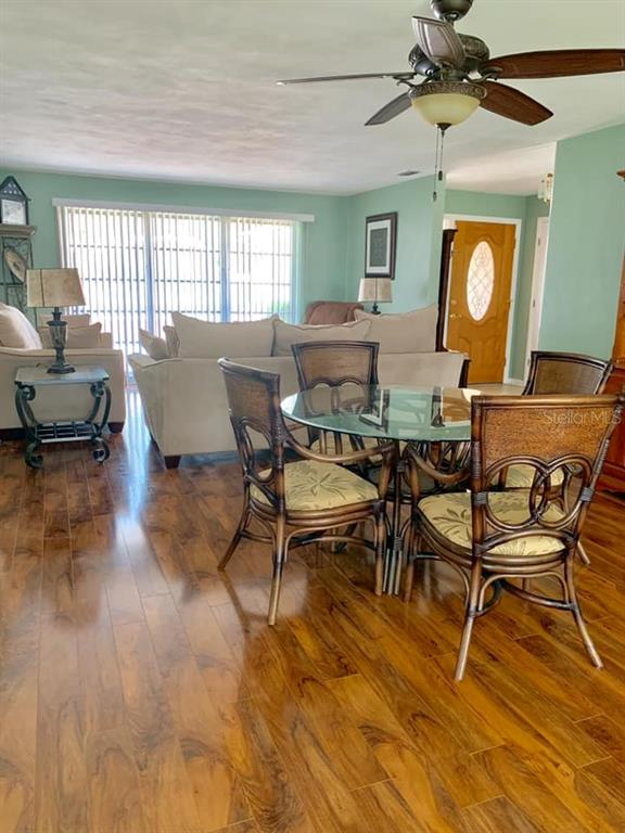 14424 Neptune Road Seminole, FL 33776 - Photo 8 of 32 Living Room/Dining Room