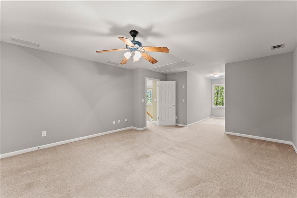 1040 Auburn Road Dacula, GA 30019 - Photo 30 of 42 a view of an empty room with a window