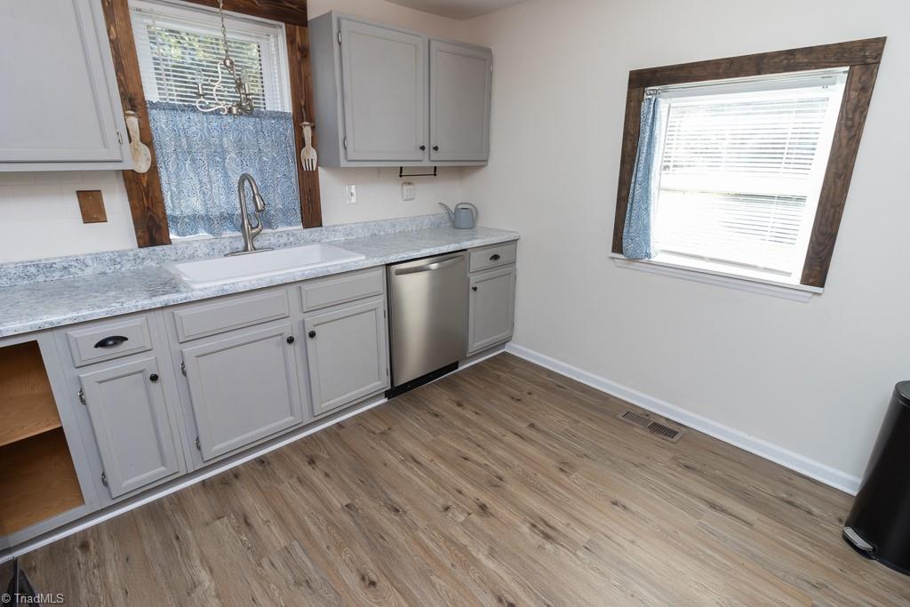 2327 Scalesville Road Summerfield, NC 27358 - Photo 15 of 22 PLENTY OF LIGHT IN THE KITCHEN WITH 2 WINDOWS.