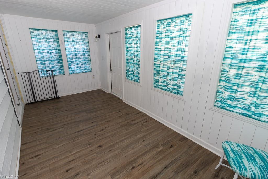 2327 Scalesville Road Summerfield, NC 27358 - Photo 7 of 22 THIS ROOM COULD BE MANY THINGS.. OFFICE, SUNROOM, DINING ROOM.