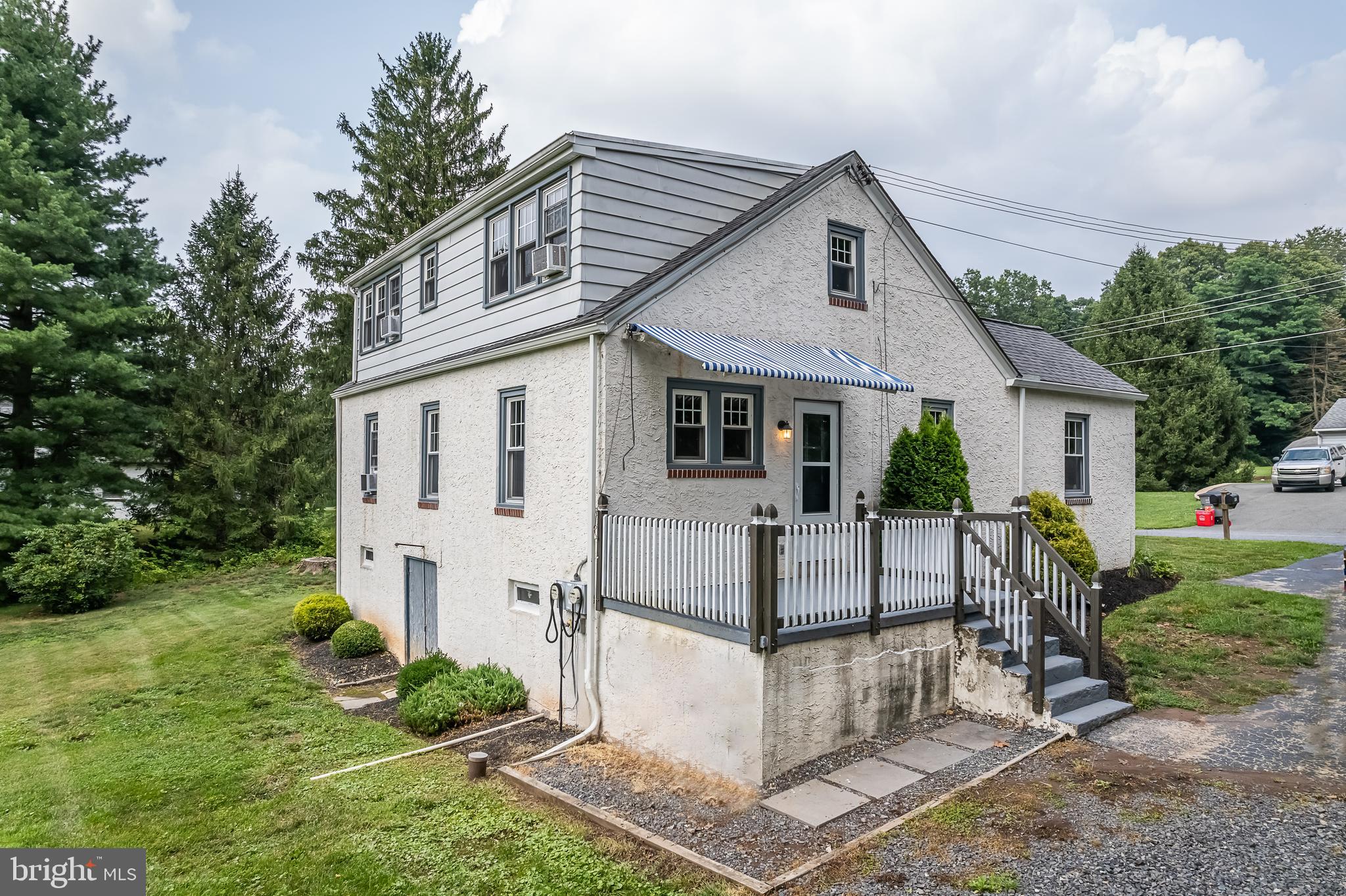 442 Saylors Mill Road Spring City, PA 19475 - Photo 1 of 26 a view of house with a yard and sitting area
