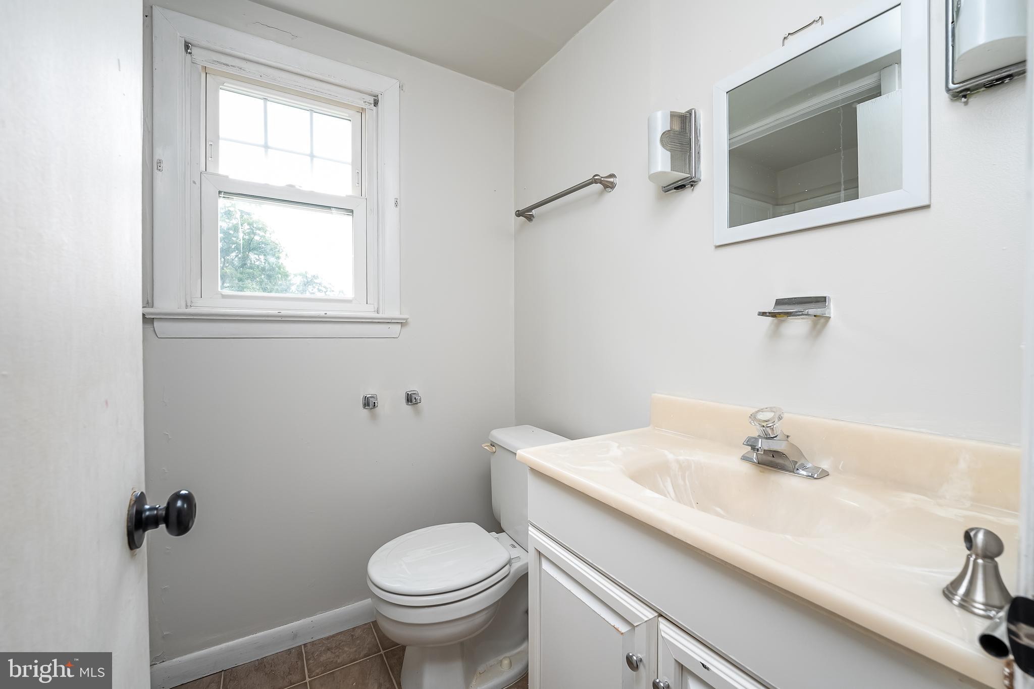 442 Saylors Mill Road Spring City, PA 19475 - Photo 17 of 26 a bathroom with a sink toilet and vanity