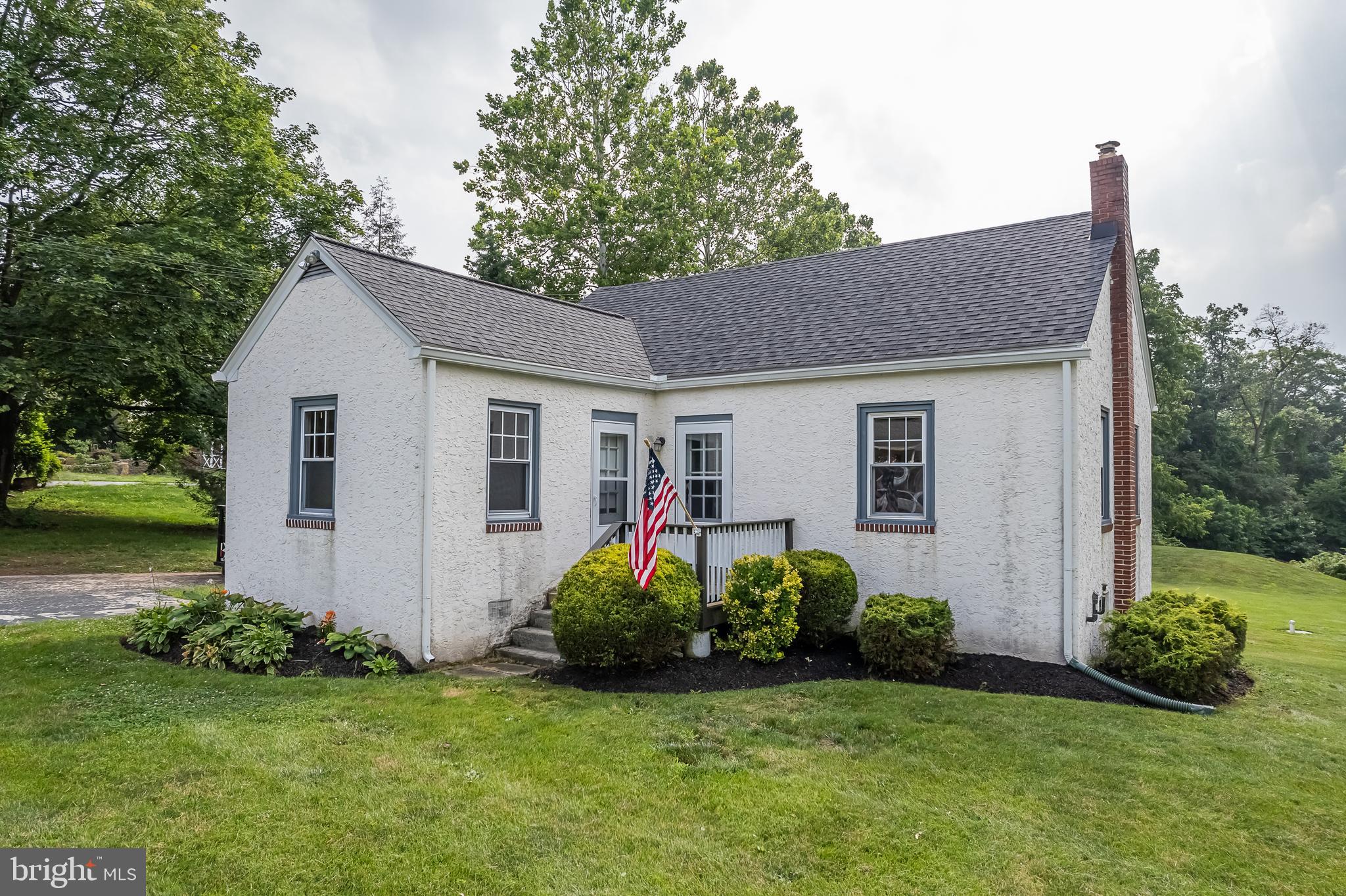 442 Saylors Mill Road Spring City, PA 19475 - Photo 22 of 26 a front view of a house with garden
