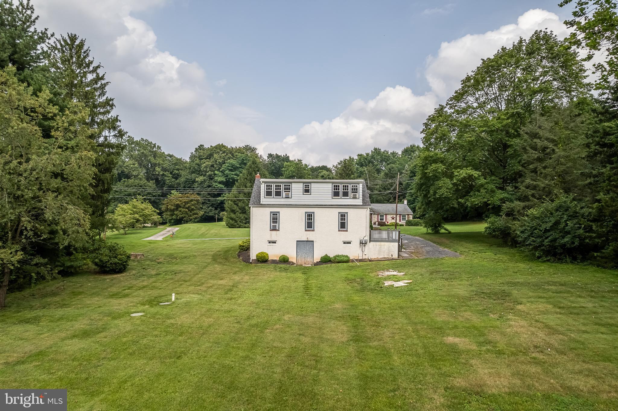 442 Saylors Mill Road Spring City, PA 19475 - Photo 23 of 26 a white house with a yard in front of it