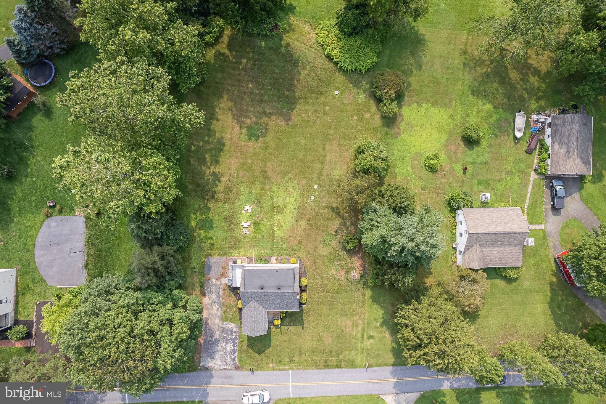 442 Saylors Mill Road Spring City, PA 19475 - Photo 26 of 26 a aerial view of a house with outdoor space and trees all around