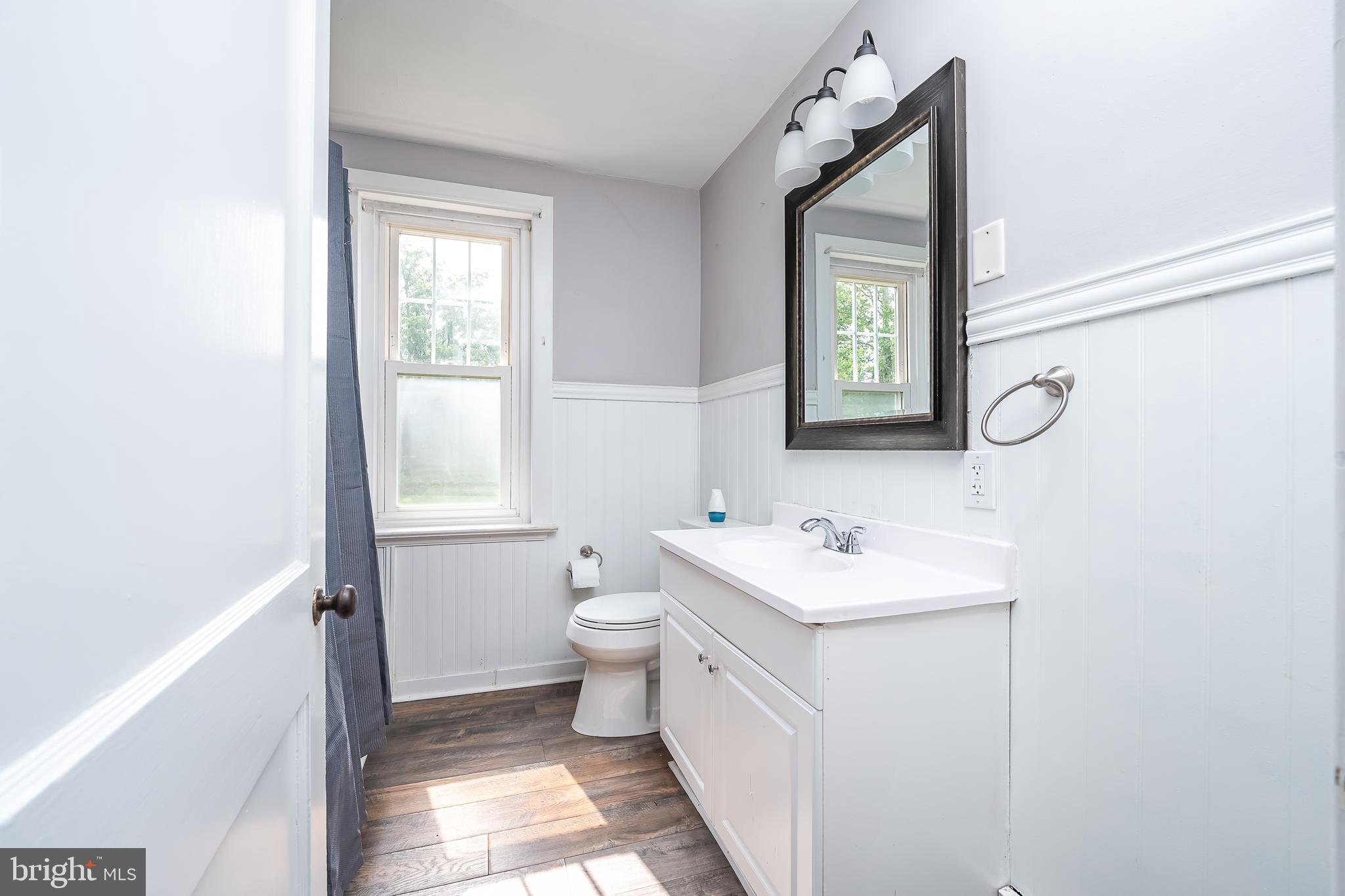 442 Saylors Mill Road Spring City, PA 19475 - Photo 10 of 26 a bathroom with a toilet sink and mirror