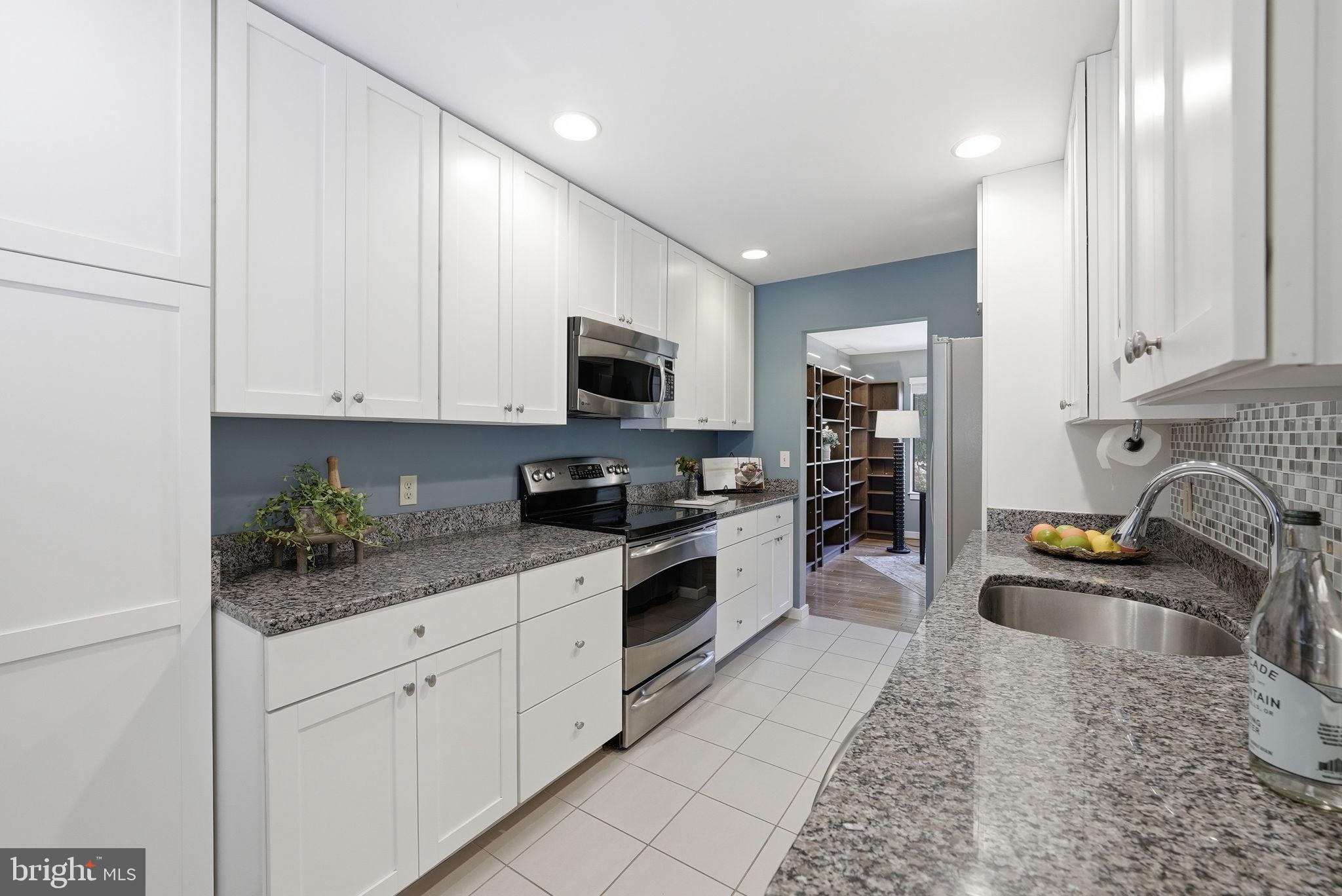11124 Glade Drive Reston, VA 20191 - Photo 9 of 47 Kitchen Features Ample Storage