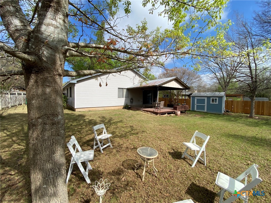 8305 Fort Sumter Road Austin, TX 78745 - Photo 13 of 23 a front view of a house with swimming pool